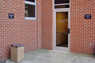 A smoking area was located next to the rear entrance of the building.