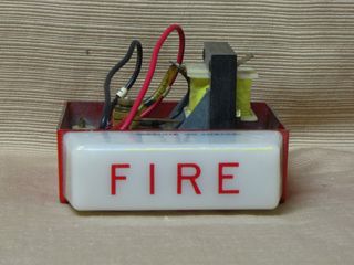 Wheelock 7002-24, top view, showing "FIRE" lettering on top of strobe