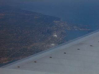 Toronto, as seen from the plane. That white spot in the center of the picture is SkyDome, and then directly behind it (but not easily visible in this picture) is the CN Tower.