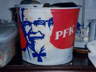 The KFC bucket, as most things are in Canada, was bilingual in French and English. This is the French side, showing KFC in French: PFK.