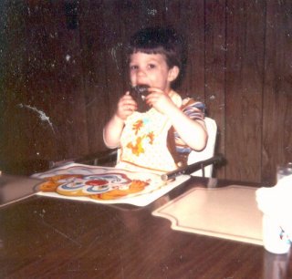 Visiting Pop and Grandma Schumin, we find me doing one of the things I did best – eating a “flying saucer”, which was an ice cream sandwich with vanilla ice cream and chocolate cookie outsides.