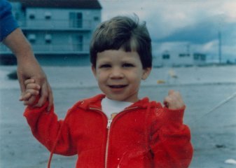 Here I am on the beach at Sea Isle City, New Jersey, holding Mom’s hand.