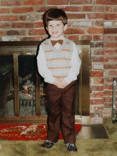 This photo is what resulted from the poor experience at Olan Mills. My parents dressed me up, and took photos of me in the house. Result: adorable!