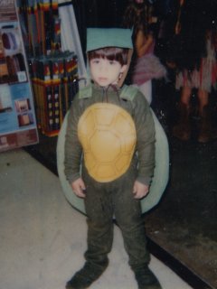 At Kmart in Rogers in 1986, at their children's halloween event. I won first prize for this turtle costume that Mom made for me.