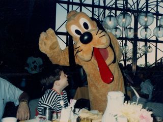 On our 1989 vacation to Florida, while attending the character breakfast at the Contemporary Resort, I spent a moment with Pluto.