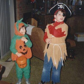 Halloween 1989. I went as a pirate, and Sis went as a pumpkin.