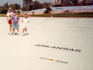 A giant map of the United States is spread out before us... so Mom, Sis, and myself got our picture taken while standing on Rogers, Arkansas.