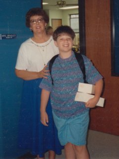 Here I am, posing for a photo with my fifth-grade teacher, Mrs. Bradley, on the first day of school. Fifth grade was by far my worst experience in school, and this photo marked the beginning of that nightmare. None of us expected how bad things would get that year, as relations between my family and the school hit rock bottom.