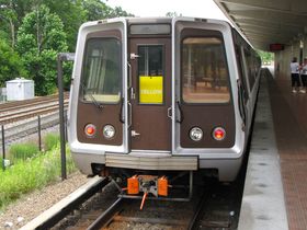 Front windows: The front windows on the 4000-Series cars have a thin black border around them, with rounded corners. The bulkhead door window has squared corners.