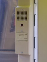 Emergency intercom: 4000-Series cars have a tan intercom with a single button. Signage does not glow in the dark.