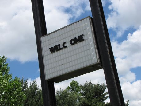 "WELCOME" message on the sign, still intact 13 years after the restaurant closed.
