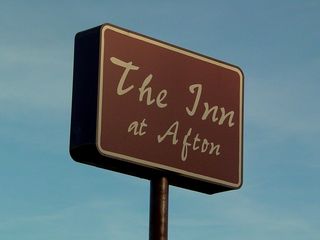 The Inn at Afton was built in 1968 according to property assessment records, and was a Holiday Inn until the mid-1990s. The motel has an access road from US 250 that is separate from all the other businesses. Additionally, the Inn at Afton is the only business visible from Interstate 64, which certainly contributes to its staying in business.