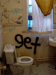 Even the bathroom, with a sign saying "Chuck Burgundy, Philanthropist" on the door, was covered with graffiti.