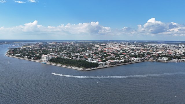 Aerial view of the southern end of Charleston from offshore, showing the South of Broad neighborhood.