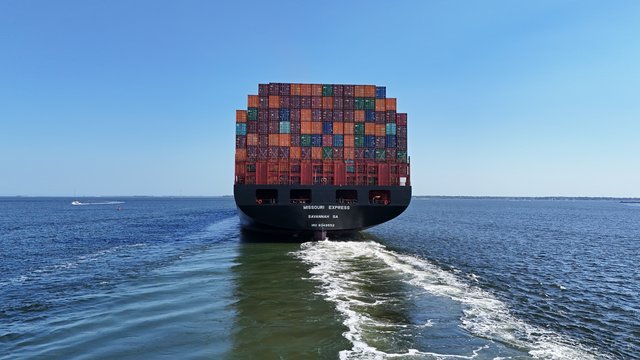 The stern of the Missouri Express, a US-flagged container ship, traveling down the Cooper River.