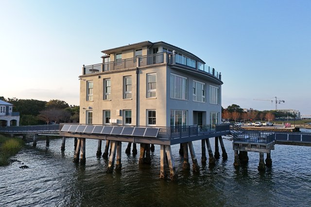 2 Concord Street, constructed on pilings over the water.