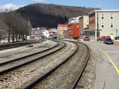 View of the railroad tracks from Queen City Pavement, facing north.