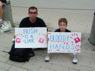 Other participants came out with their own signs, either critical of George W. Bush, or with messages of a more personal nature.