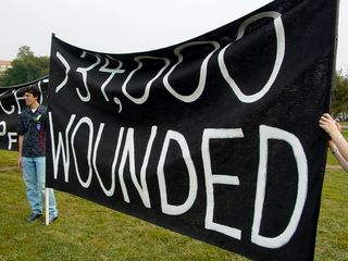 The large black banners also made it to the Ellipse, and were being held up by participants.