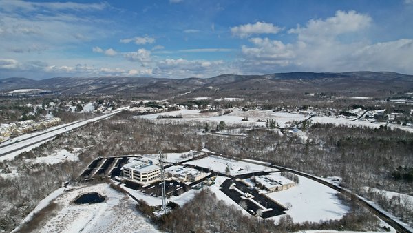 A snowy day in Waynesboro, Virginia, viewed from above the Berry Global facility, facing east.