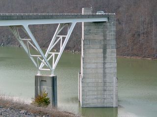 In fact, I didn't even realize that I was standing right on Gathright Dam! I thought that the structure pictured here was the dam. And so I wondered how on earth this did the job of keeping back the water, considering that it didn't appear to even extend all the way across. It soon clicked with me that I was actually standing on the dam...