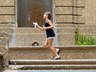 While I was working on the lower level, a small girl kept running back and forth across the sidewalk past the top of the fountain. It must be a full-time job keeping up with her.