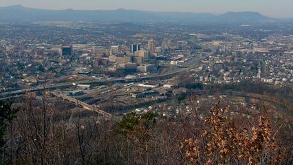 On the other side of the mountain, the city stands proudly...