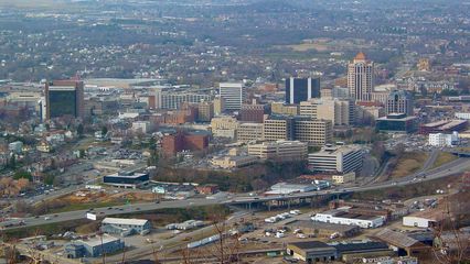 On the other side of the mountain, the city stands proudly...