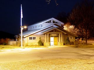 At the Discovery Center, the lighting intended for the American flag outside lends an interesting effect to the building, lighting it in yellow below, and in white above.