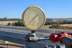 Water pressure gauge on the fire standpipe system in the parking garage at Dulles International Airport.