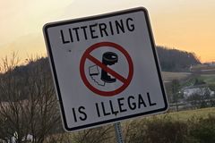 Sign on US Route 11 in Weyers Cave, Virginia reminding drivers that littering is illegal.