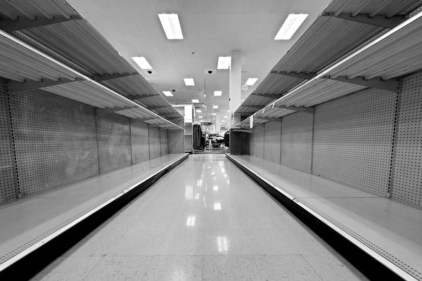 Empty aisle at the Target store in Gaithersburg, Maryland that would normally be filled with paper towels.  Due to panic buying following the declaration of a pandemic and advisories to stay at home, people bought out stores' supplies of paper towels, toilet paper, bread, milk, and cleaning supplies.