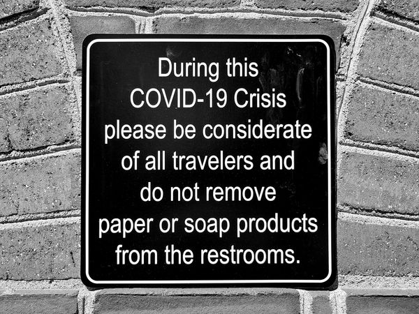 Signage at a rest area along Interstate 95 in Dale City, Virginia posted in response to the panic buying of paper products and cleaning supplies, urging travelers not to steal products from the restrooms.