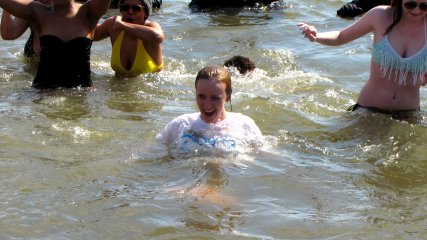 A woman floats in the water during the second plunge of the day.
