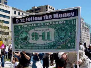 This sign of an altered $1 bill was part of another theme - money, claiming that the war on terrorism was a matter of following the trail to the money.