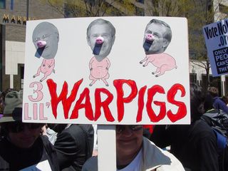 With this new twist on the "Three Little Pigs" story, this poster depicts President George Bush, Vice President Dick Cheney, and Defense Secretary Donald Rumsfeld as "War Pigs".