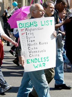 This protester's sign expresses straight up what a number of protesters were afraid of. That being the thought that it seems like Bush has a laundry list of nations to invade and conquer.