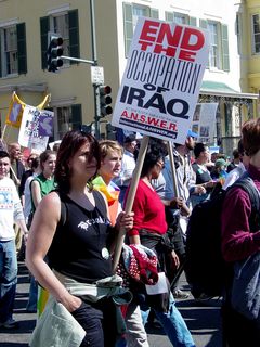 More and more protesters pass by, making their messages known to everyone around...