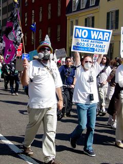 And now we again run into our masked protesters with the cool flag. While they may not wish to show their faces, their call for peace does indeed say a lot.