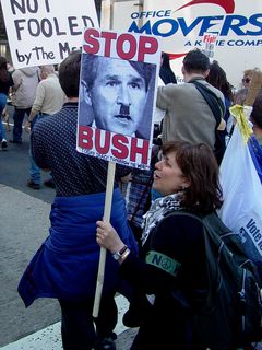 This protester decorated a picture of Bush to appear like Hitler, adding a bit of hair that Bush naturally doesn't have to increase this appearance. This was not the only case where Bush was likened to Hitler, but by far the most dramatic illustration.