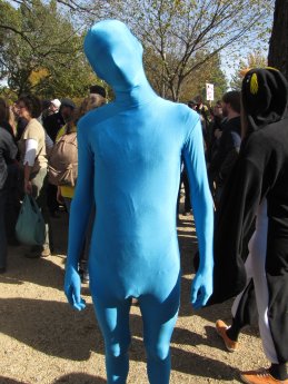 A man wears a blue zentai suit.