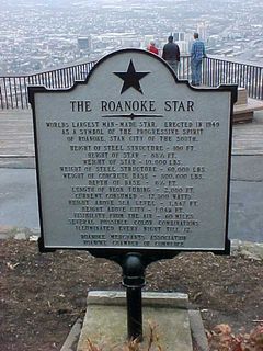 In front of the star sits a historical marker containing facts and figures. The star was erected in 1949 as a symbol of the progressive spirit of Roanoke, the Star City of the South. I think some of the figures that they give for the star are absolutely amazing. The star itself weighs 10,000 pounds, the steel support structure weighs 66,000 pounds, the concrete base weighs 500,000 pounds, and this thing eats 17,500 watts of power. Additionally, it's visible from the air for 60 miles.