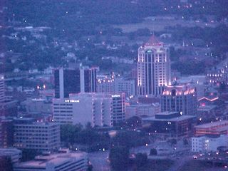 The Roanoke skyline at sunset is a gorgeous sight, with the buildings already lit up before the sun's gone completely down, allowing for a beautiful lighting of building features.