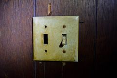 Light switches in the second floor hallway, at the top of the stairs