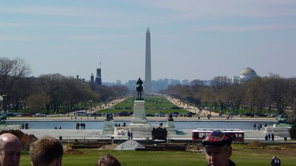 The view from the Capitol is indeed majestic, with statues and the reflecting pool nearby, the Washington Monument down the Mall, the dome of the Smithsonian Natural History Museum at right, and the Lincoln Memorial and the skyscrapers of Rosslyn off in the distance.