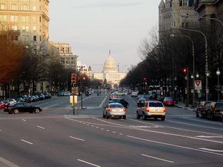 Later on that day, in the evening, the Capitol shines almost a golden color in the setting sun. These two photos were taken from Freedom Plaza, at approximately 13th Street and Pennsylvania Avenue NW.