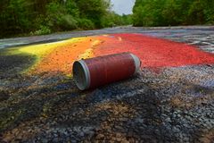 Discarded spray paint can on the Graffiti Highway in Centralia, Pennsylvania, likely used for tagging the road.