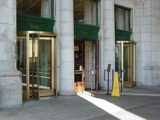 Through these revolving doors, we enter the shopping area.