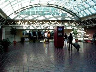 Beyond the shops is a modern train station. I saw this, and it immediately reminded me of an airport terminal. Shops and stuff were there, most notably a Sbarro, plus you boarded your trains at certain gates, with a similar system relaying arrivals and departures - the what, when, and where.