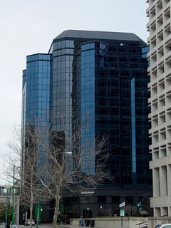 The Main Street Tower, a postmodern building built in 1994 and home to SouthTrust Bank offices, has a unique look in Norfolk. To me, it almost appears that the building is wearing a vest, with the two projections on either side of the main corners.